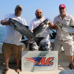 American Comrades and friends displayed caught fish